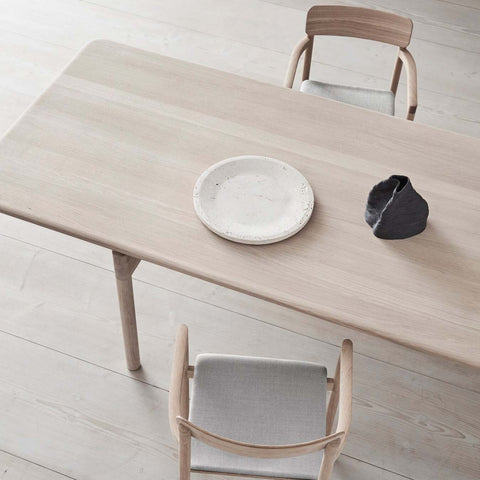 light oak oiled dining table and oak dining chairs designed by fredericia furniture