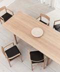 post dining table and post dining chairs designed by Fredericia Furniture