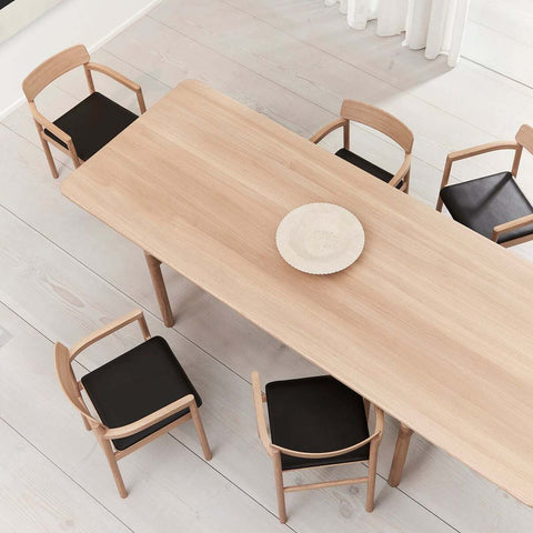 post dining table and post dining chairs designed by Fredericia Furniture