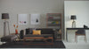 Blu Dot Strut Coffee Table styled in a modern living room with sofa and floor lamp