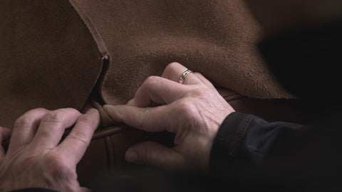 video of danish craftsman making the Borge Mogensen 2212 sofa with leather for fredericia furniture 