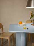 Muuto Re Norm Table 130 in light blue with oak dining chairs in modern Scandinavian interior