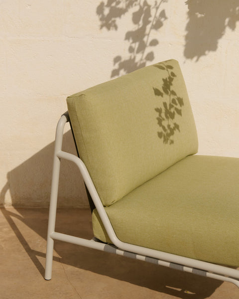 Muuto Settle lounge chair in green outdoor upholstery with light powder coated frame