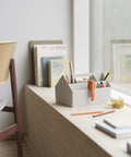 Muuto Sketch Toolbox in neutral tones enhancing modern workspace decor