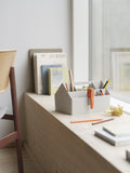 Muuto Sketch Toolbox in neutral tones enhancing modern workspace decor