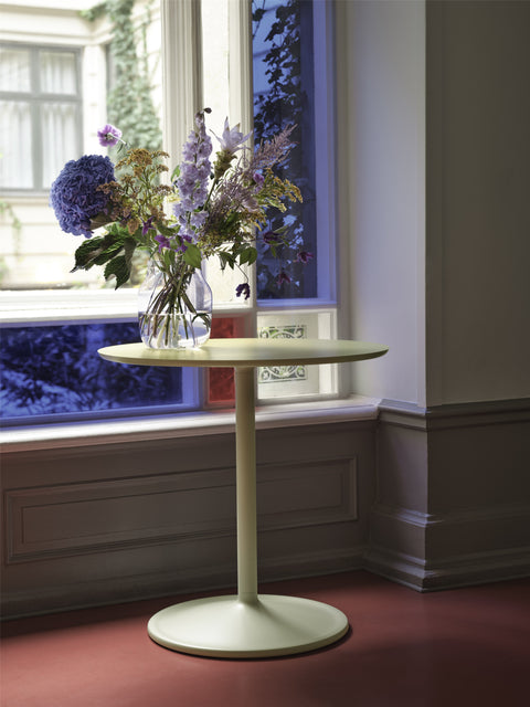 muuto soft side table with flower vase lifestyle image