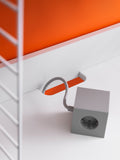 String System media shelf in white with integrated cable management cut-out for electronics and accessories”