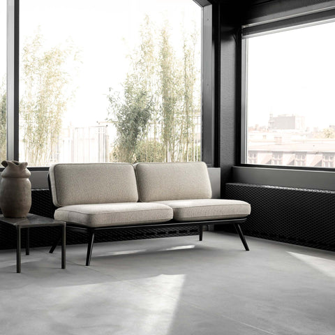 Scandinavian minimalist lounge sofa with black base by fredericia furniture 