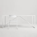 Trim Chair by Blu Dot in White perforated powder-coated steel, front view with Strut dining table