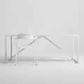 Trim Armchair by Blu Dot in White perforated powder-coated steel, front view with Strut dining table