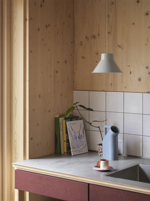 simple and elegant scandinavian water pitcher on countertop 