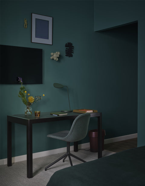 moody bedroom workspace with furniture from muuto