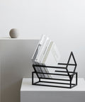 Black Powder Coated Steel book storage from Kristina Dam studio