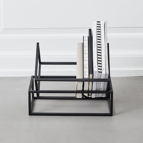 Elegant, simple and sculptural book storage from Kristina Dam